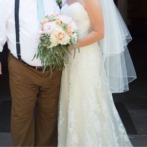 Maggie Sottero wedding dress w/ beautiful lace detailing and silk corset bodice